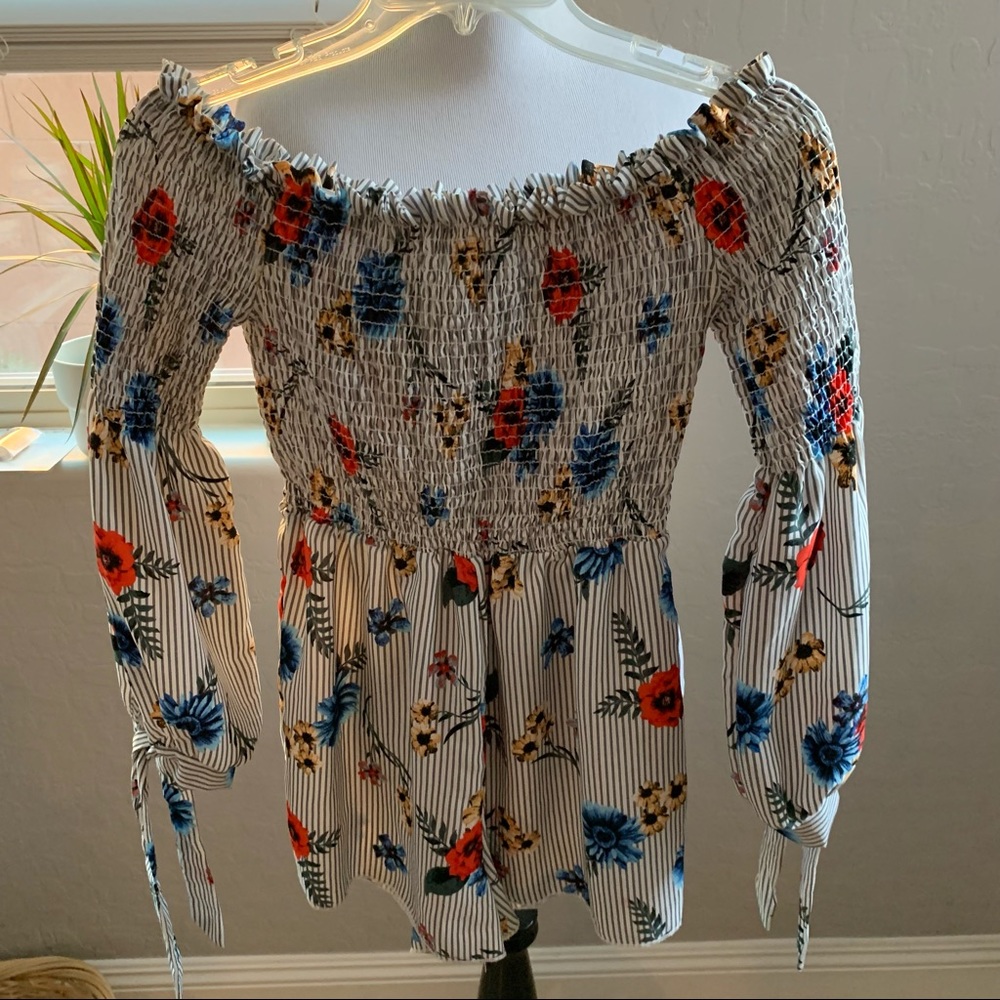 Off the shoulder floral romper ties on arms medium